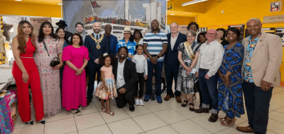 Large group of BAME including elders and children